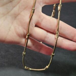 Vintage Lady Remington gold tone necklace 16-19"